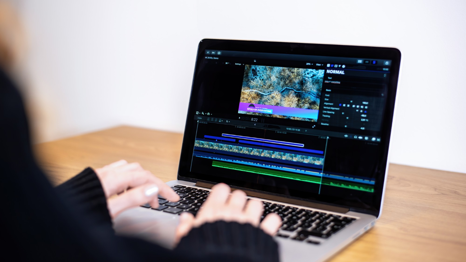 Professional video editor refining footage with advanced editing software